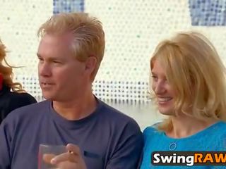 Cum-hungry wife drains guy's johnson during grand swinger party